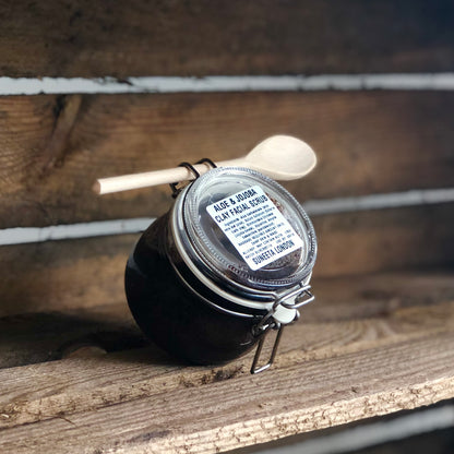 aloe jojoba clay facial scrub suneeta on wooden crate with mini wooden spoon, 175g container kilner jar