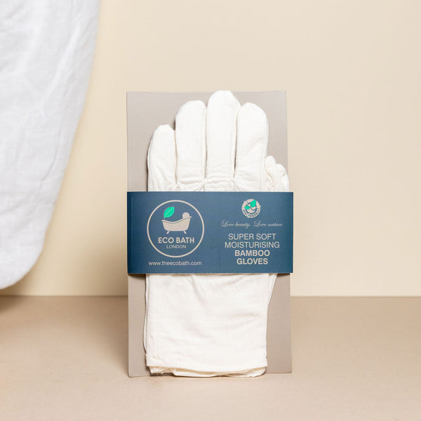 eco bath super soft moisturising bamboo gloves on natural cream background
