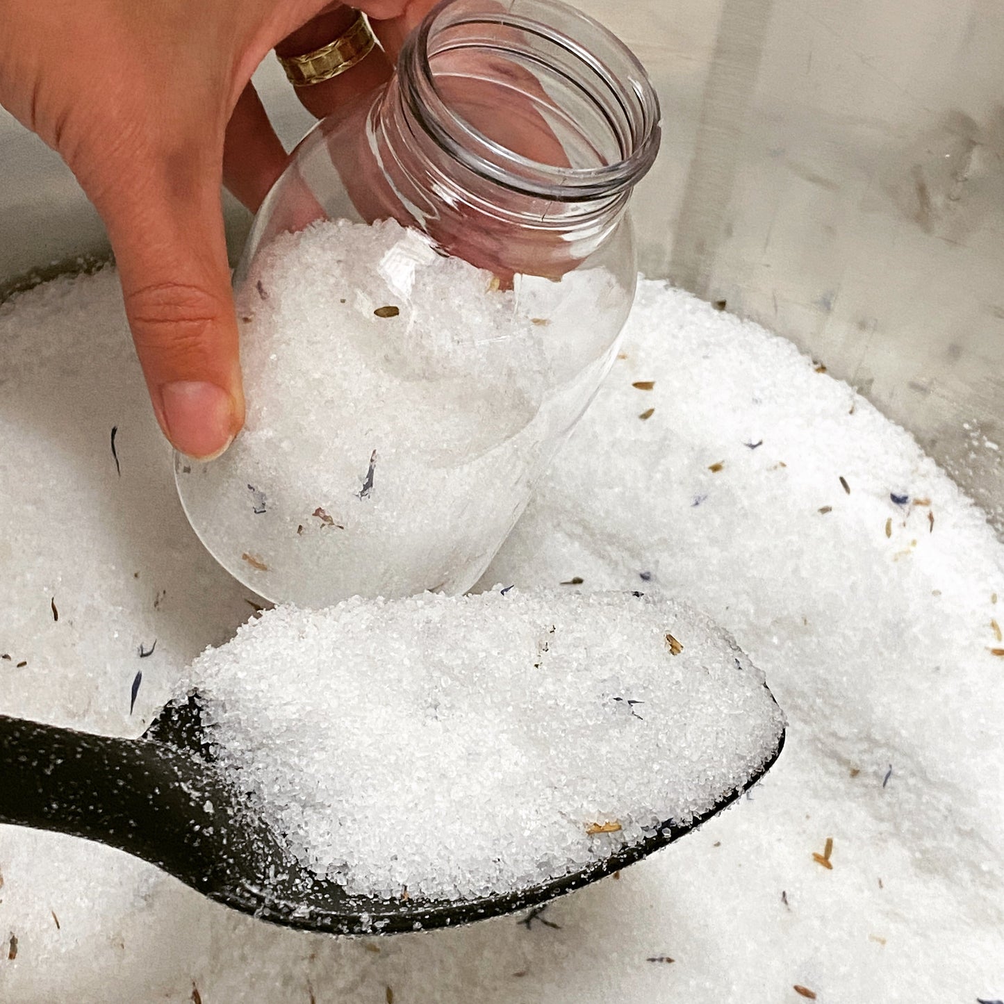 hand potting suneeta's bath salts lavender, close up