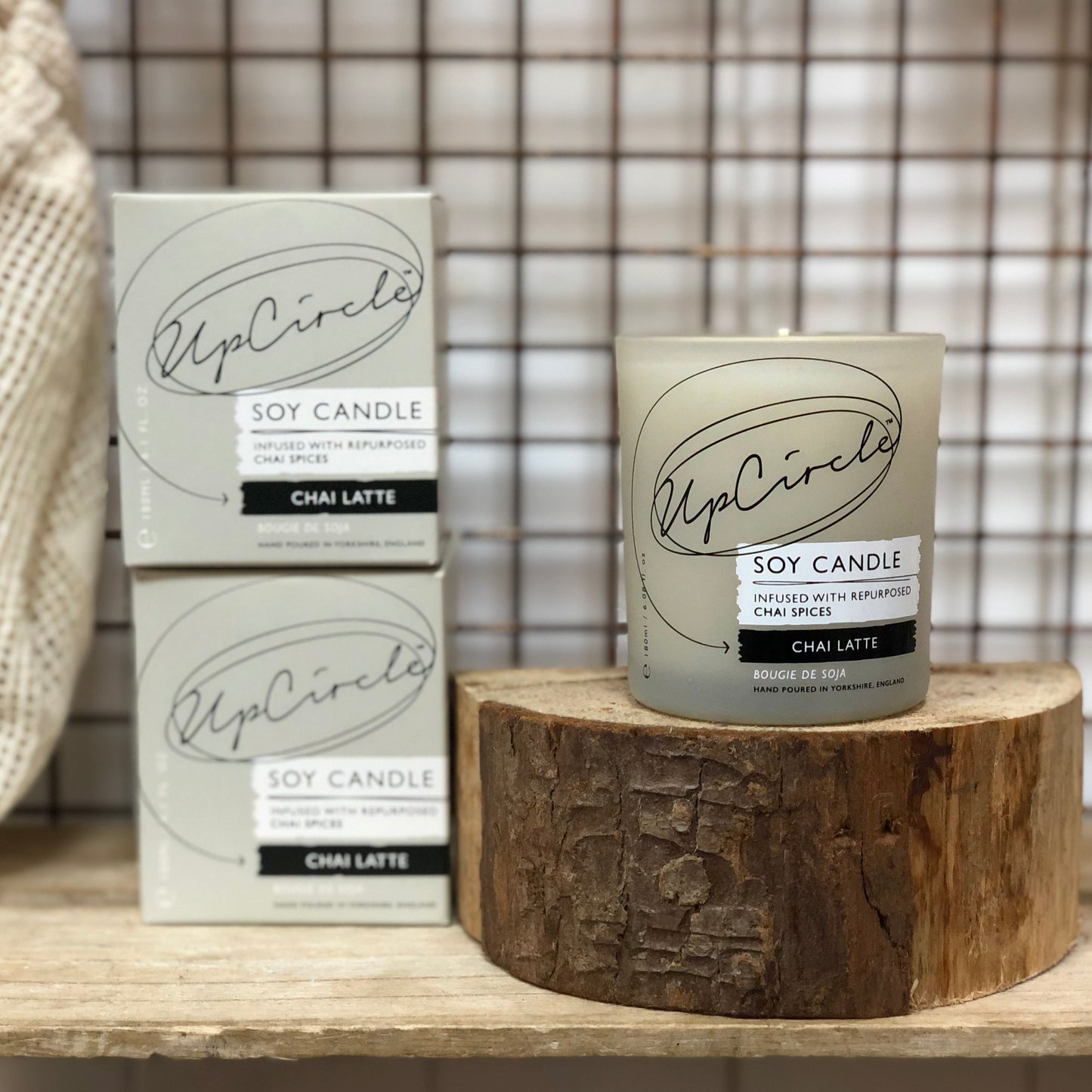 up circle soy candle on display in weigh and pay